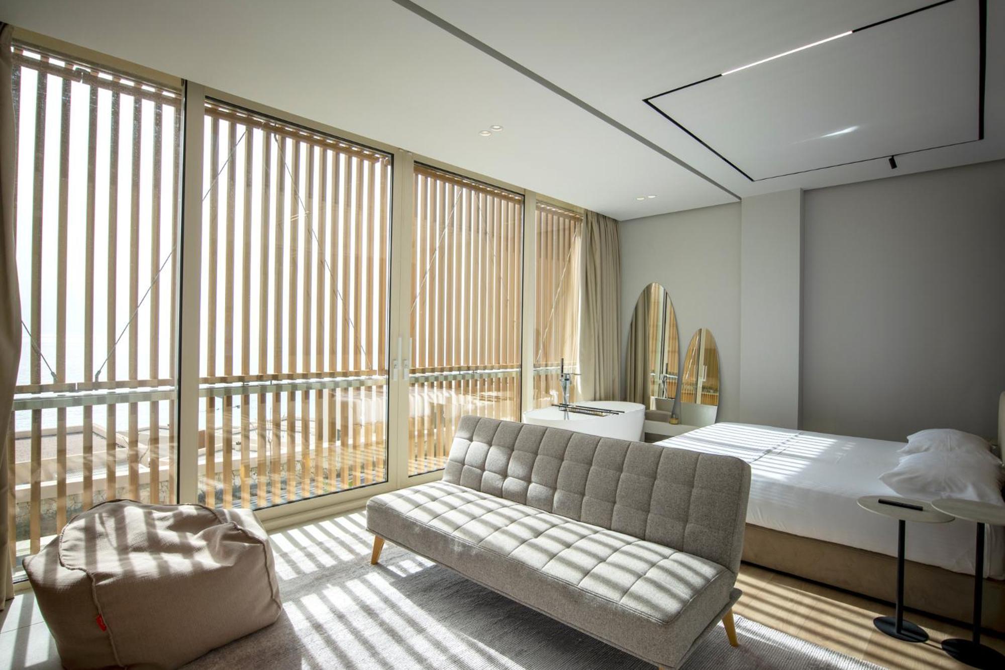 Green Coast Hotel Paljasa Bagian luar foto