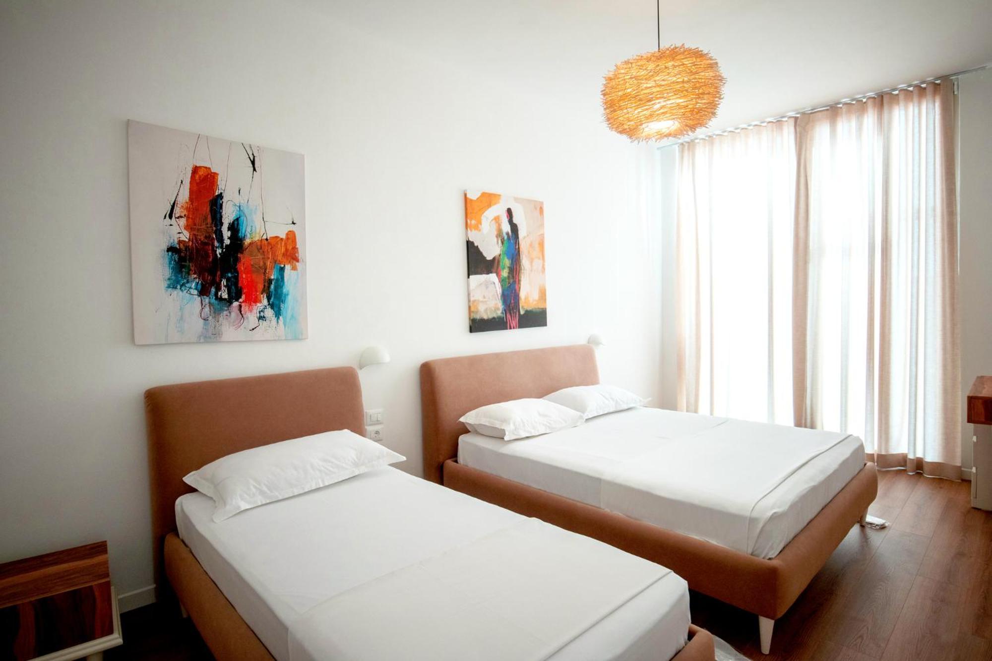 Green Coast Hotel Paljasa Bagian luar foto